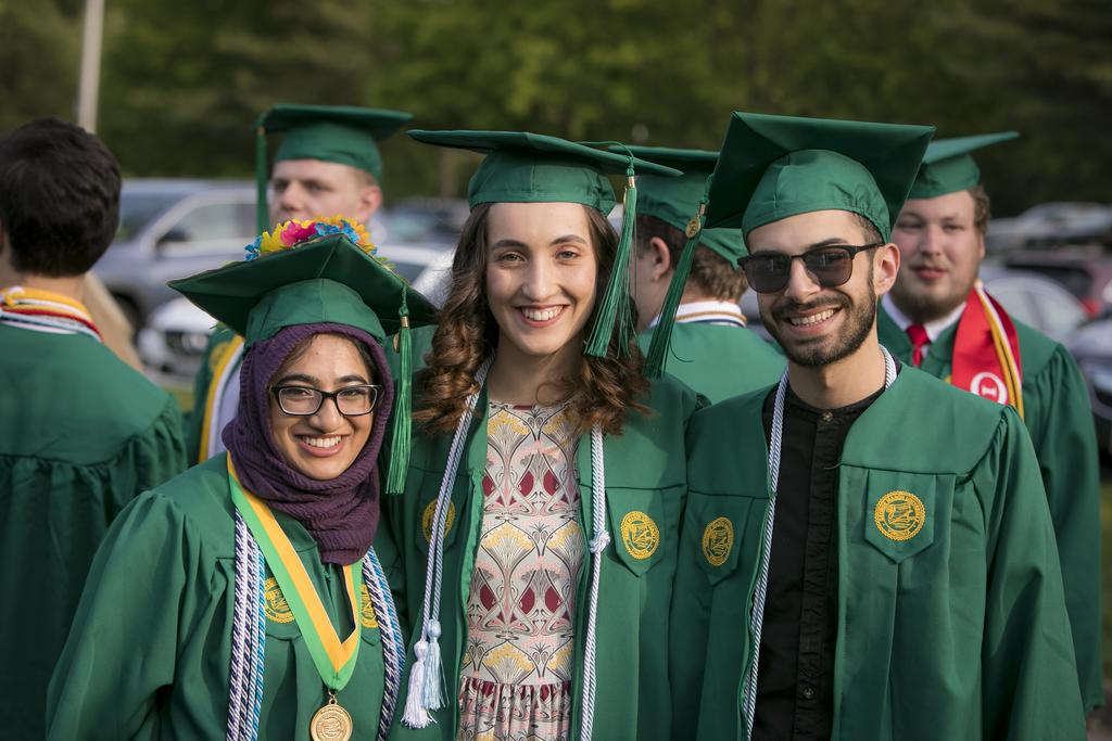 Schar School students wearing their cap and gown during the graduation ceremony