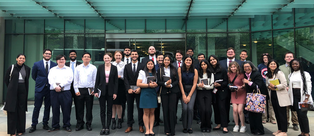Students from the Schar School learning communities pose for a picture outside the Council on Foreign Relations during a field trip to the think tank.