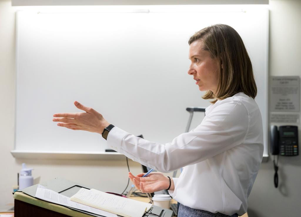Assistant Professor Meghan Garrity addresses her class.